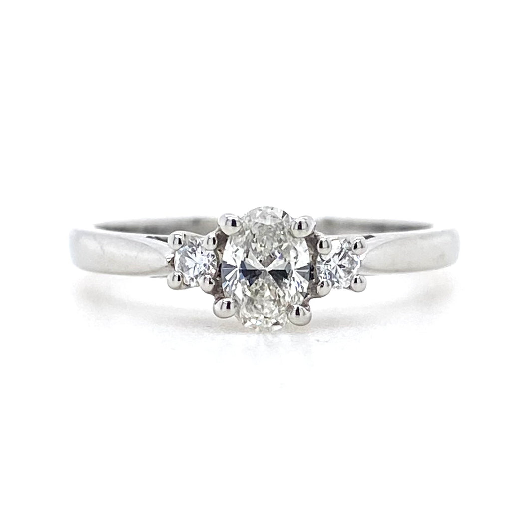 Platinum, 0.40ct G VS1 Oval Diamond Trilogy Ring